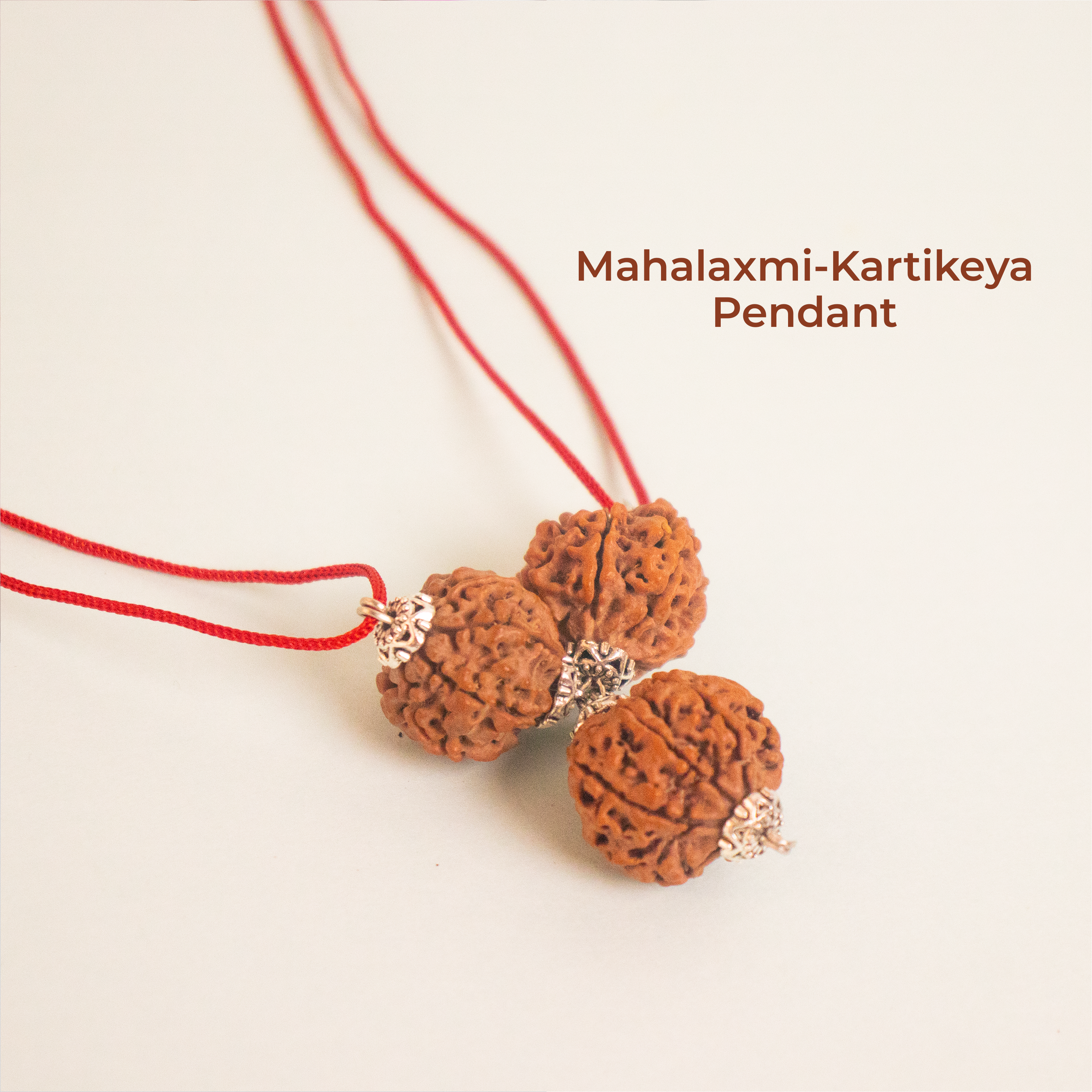 Mahalaxmi Kartikeya Pendant – 2 Seven Mukhi & 1 Six Mukhi Rudraksha
